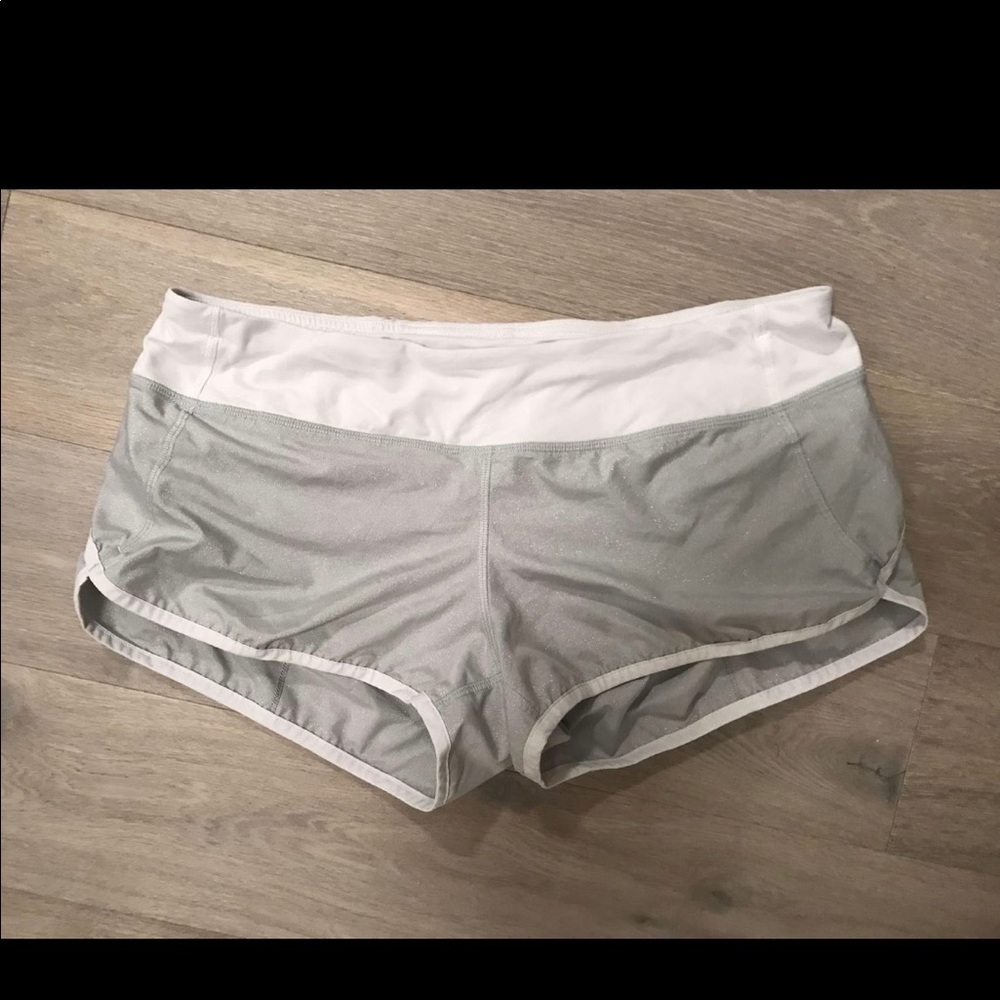 Grey shimmer lululemon shorts with white trim